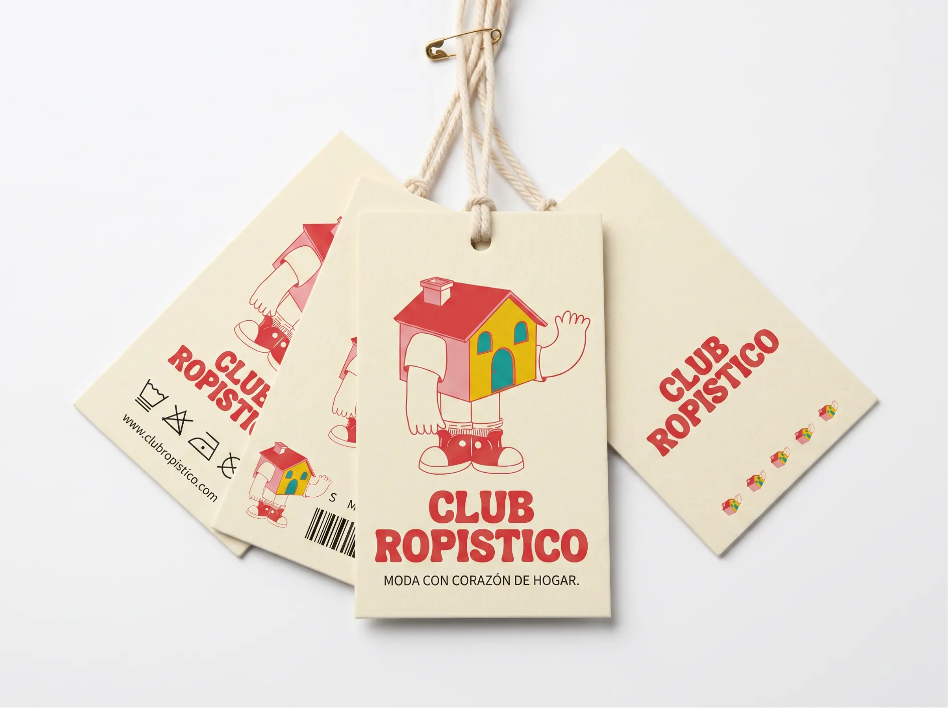 Cream Club Ropístico hang tags with cotton string, the house mascot and red rounded lettering.